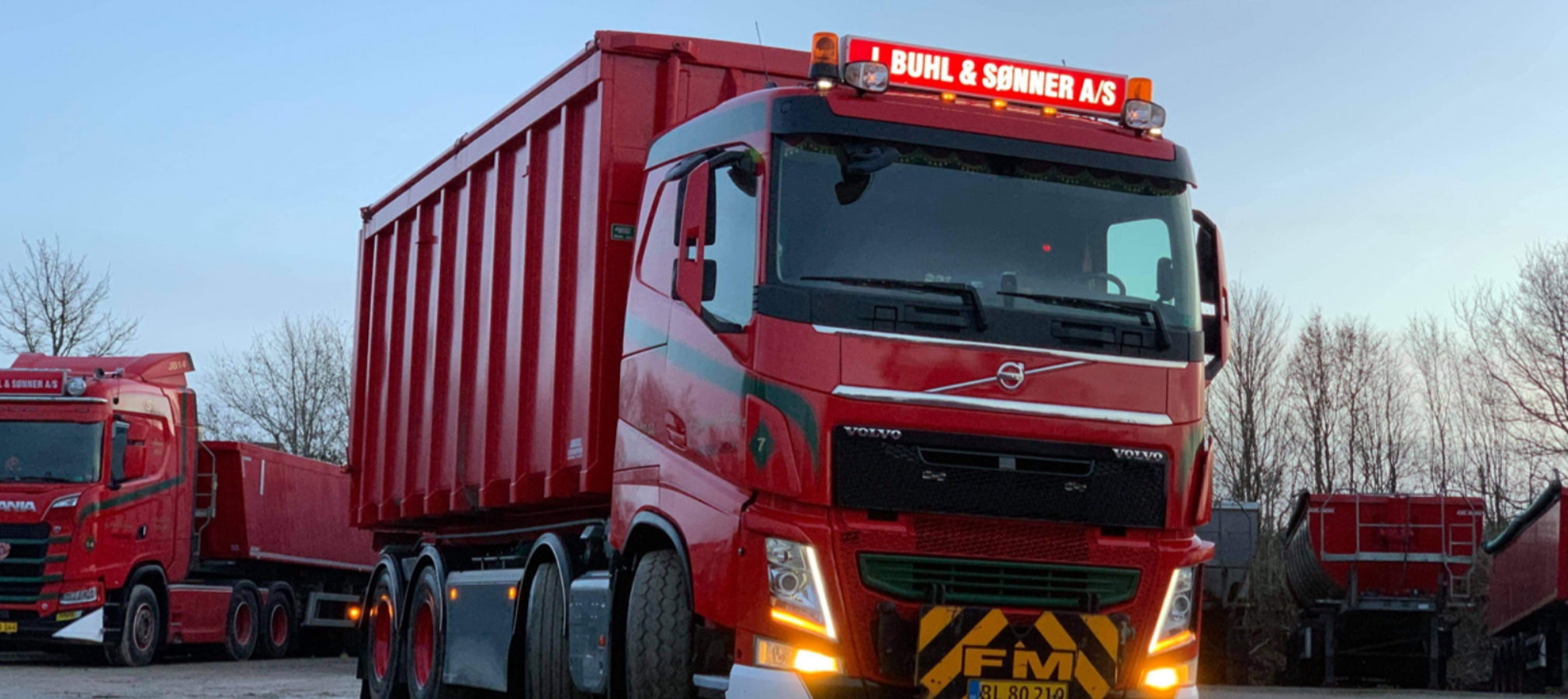 Lastbil fra J. Buhl & Sønner A/S som transporter container 